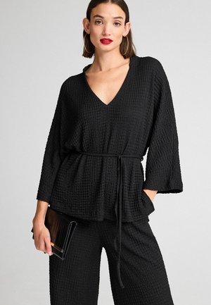 TEXTURED PETITE - Tunica - black