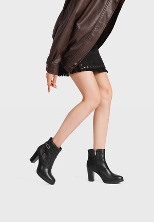 Stivaletti con tacco - nero