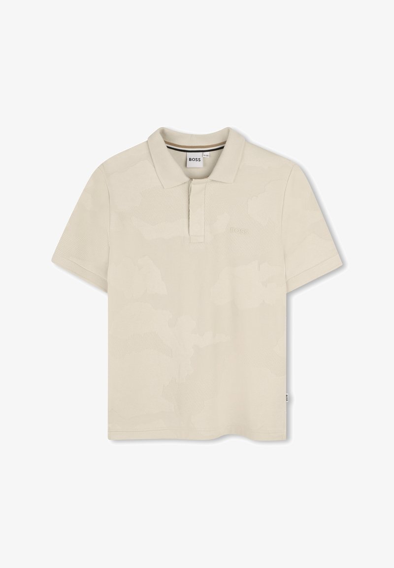 Polo beige realizzato in tessuto a trama con colletto e maniche corte. Presenta un motivo sottile e un logo sul petto.