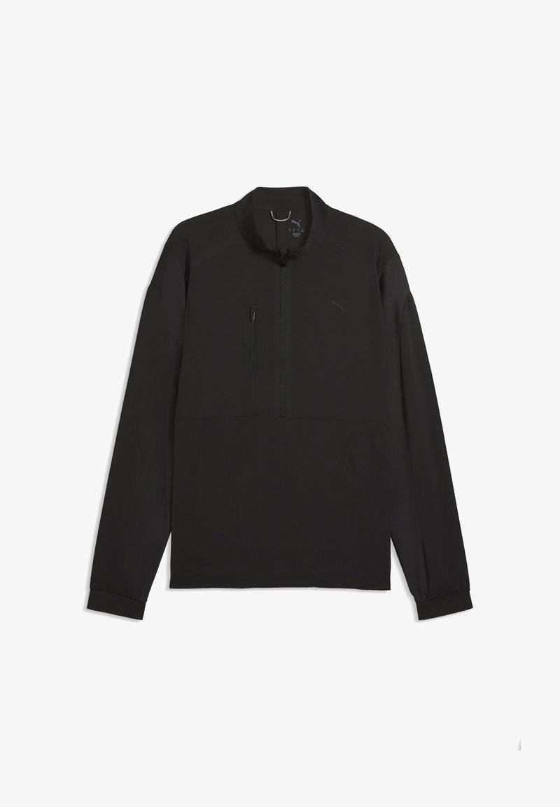 Veste noire en tissu léger, avec une fermeture éclair au quart, une poche sur la poitrine et des poignets élastiques. Design minimaliste sans motifs visibles.