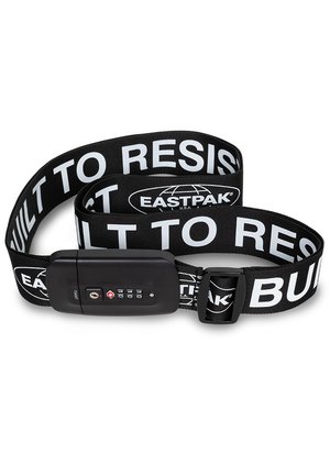 Black elastic luggage strap with "BUILT TO RESIST" printed in white. Features a combination lock and a branded black plastic buckle.