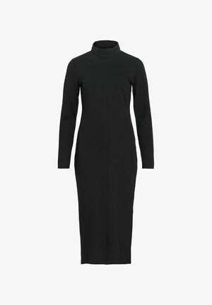 Svart kjole med lange ermer og høy hals, laget av elastisk stoff. Har en tettsittende silhuett og en vertikal søm ned midten.