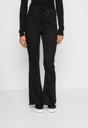 Vaqueros a campana - black
