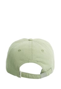 Lichtgroene katoenen pet met een gebogen rand, verstelbare band aan de achterkant en een klein merketiketje aan de zijkant. Geweven stof met stiksels.