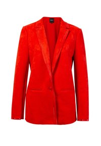 Rød ruskindsblazer med notch-lapel, single-knaplukning og to forlommer. Har fremtrædende syninger for ekstra tekstur.