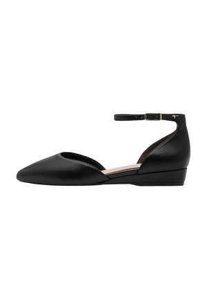 Black leather flats with a pointed toe, ankle strap with buckle, and a low wedge heel. Features a cutout design on the sides.