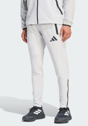 TIRO TRAVEL  - Pantalones deportivos - team light grey/black
