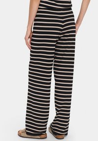 Saint Tropez MILA STRIPED - Püksid - black