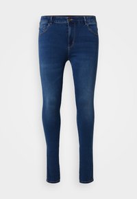 Jeans i mörkblå denim med en slim fit-design. Funktioner inkluderar fem fickor, en framknappsstängning och subtila sömdetaljer.