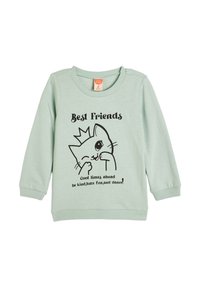 Mintgroene sweatshirt met een zwarte cartoon kat illustratie, de tekst "Beste Vrienden" en geribbelde manchetten en halslijn.