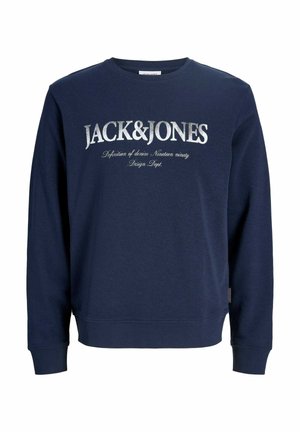 Marineblauer Pullover mit langen Ärmeln, auf der Vorderseite mit einem silbernen Logoaufdruck. Hergestellt aus weichem Baumwollstoff, mit gerippten Bündchen und Saum.