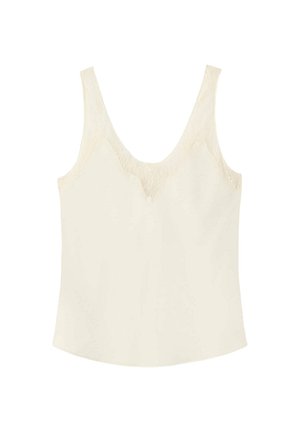 Blouse sans manches couleur crème avec un décolleté rond et des détails subtils en dentelle au niveau de la poitrine.