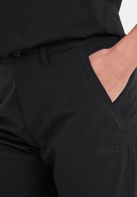 TOG24 SILSDEN - Trousers - black
