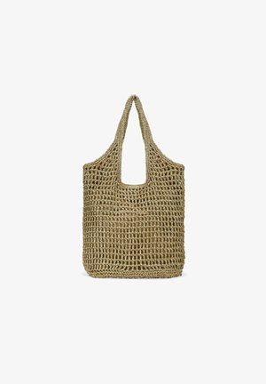 Bolsa tote tejida hecha de fibras naturales, con un diseño de malla abierta, dos asas resistentes, en un color marrón claro con una abertura rectangular.