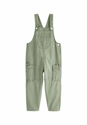 Salopette en coton vert clair avec bretelles réglables, poche poitrine avant et deux poches cargo latérales avec sangles et anneaux métalliques.