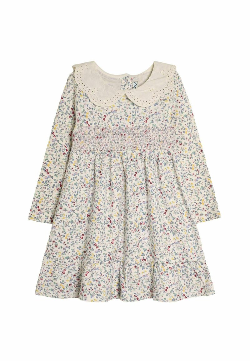 Blumenmusterkleid mit langen Ärmeln, gerafftem Bund und einem hellen Peter-Pan-Kragen. Hergestellt aus leichtem Baumwollstoff.