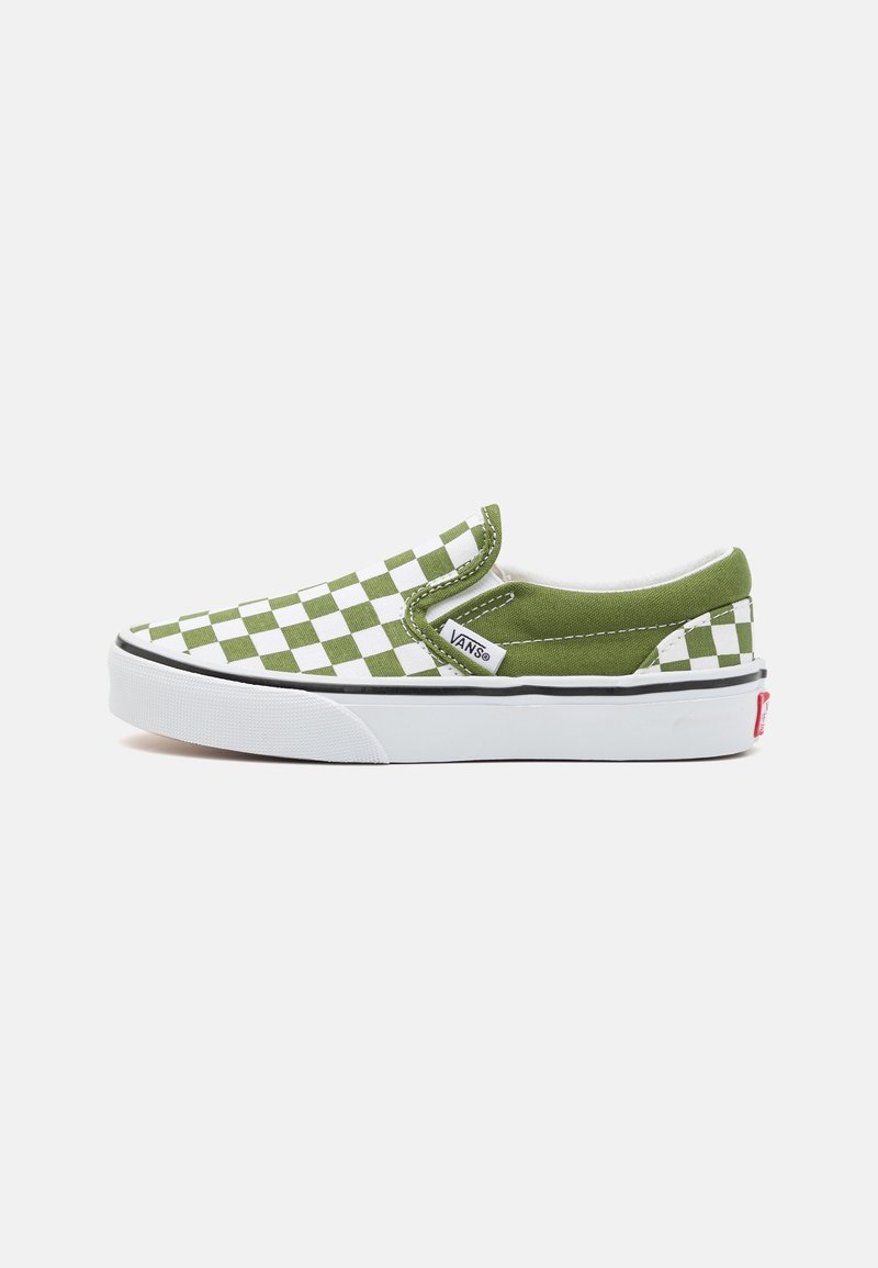 Chaussure Vans basse à enfiler avec dessus en toile à damier vert et blanc et semelle en caoutchouc blanche.
