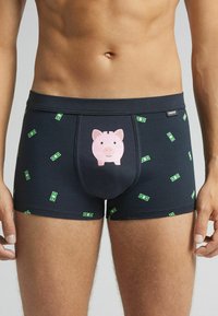 Marineblaue Boxershorts mit einem rosa Sparschwein-Graphic auf der Vorderseite, umgeben von grünen Dollarscheinen in einem verspielten Allover-Muster.