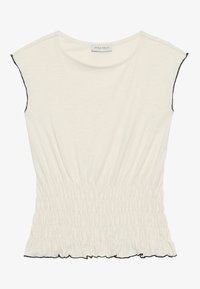 Haut blanc à manches courtes avec taille froncée, présentant un ourlet à volants et une bordure noire le long des manches pour plus de détails. Tissu doux et lisse.