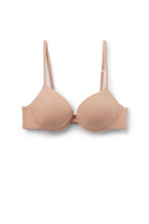 Beige gewatteerde beha met verstelbare bandjes, gladde cups en beugelondersteuning, afgebeeld op een witte achtergrond.