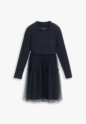 Marineblauwe jurk met lange mouwen, een aansluitend bovenstuk en een gelaagde tulen rok, voorzien van een geplooide taille en een klein blauw steraccent op de borst.