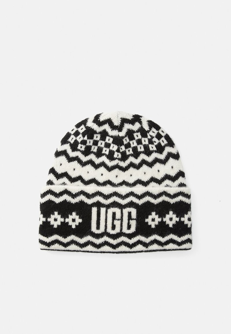 Black and white knitted beanie featuring zigzag and diamond patterns, with "UGG" logo on the cuff. Soft wool texture.
