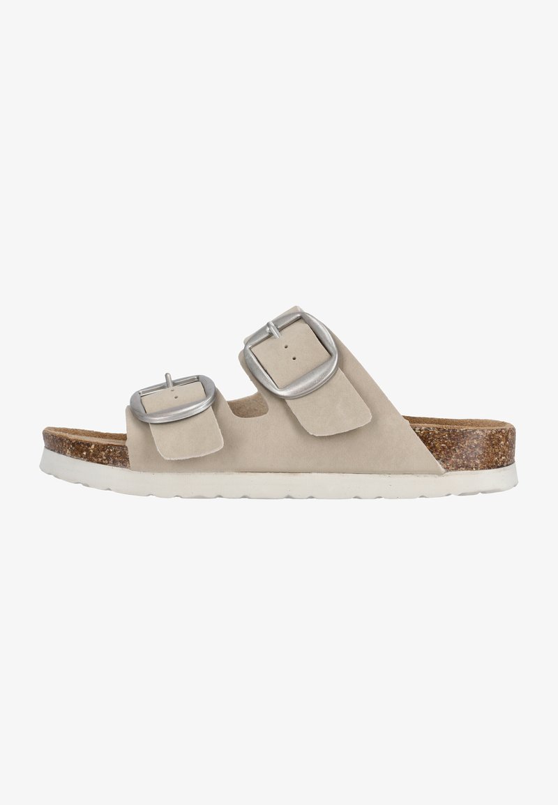 Beige Wildleder-Sandalen mit zwei verstellbaren silbernen Schnallen, Korkfußbett, weißer Gummisohle und glatter Textur. Flaches, offenes Design mit Zehenöffnung.