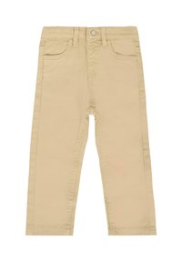 Beżowe spodnie bawełniane o prostym kroju, z dwiema przednimi kieszeniami, zapięciem na guzik oraz widocznymi detalami przeszycia.