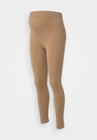 Leggings de maternité côtelés beiges avec une taille haute. Fabriqués en tissu extensible, conçus pour s'ajuster confortablement pendant la grossesse. Finition sans coutures.