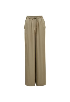 Beige, weit geschnittene Hose aus weichem Stoff. Mit einem elastischen Taillenzug und seitlichen Taschen für Funktionalität.