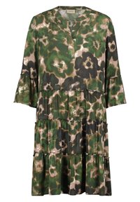 Robe ample à étages avec motif floral abstrait vert, beige et noir, col en V et manches cloche trois quarts.
