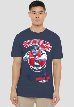 Navy blue cotton t-shirt featuring a graphic print of a character in a life vest. Text reads "QUIT PLAYING WITH YOUR DINGHY! TOMMY BOY (THE MOVIE)."