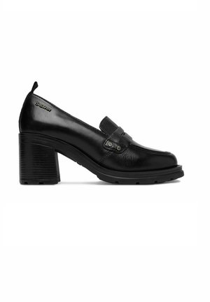 Schwarzer Damenloafer aus Leder mit Blockabsatz, dekorativem Riemen und geprägt eingraviertem G-Star Logo an der Ferseninnenseite.