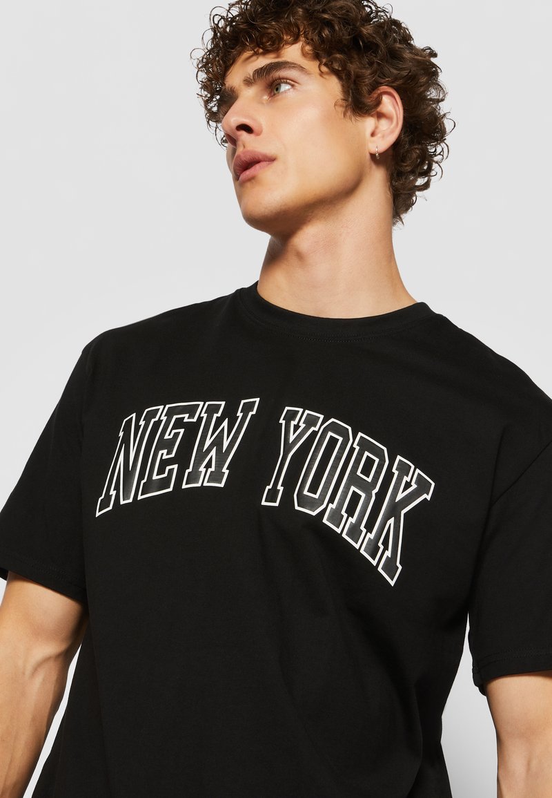 STARTER BLACK LABEL T-Shirt Uomo Oversize Patchwork - Look Classico