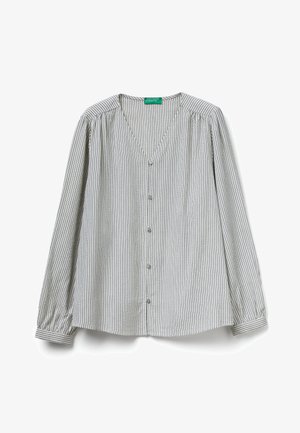 Bluzka z długim rękawem w pasy z lekkiej tkaniny. Dekolt w serek, długie rękawy z marszczonymi mankietami, z pionowymi czarno-białymi paskami.