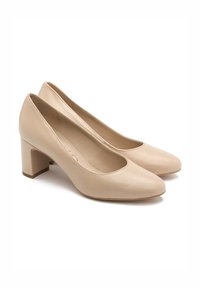 Beżowe skórzane szpilki z okrągłymi czubkami i średnim obcasem słupkowym. Gładka faktura, klasyczny design i subtelne detale szwu.