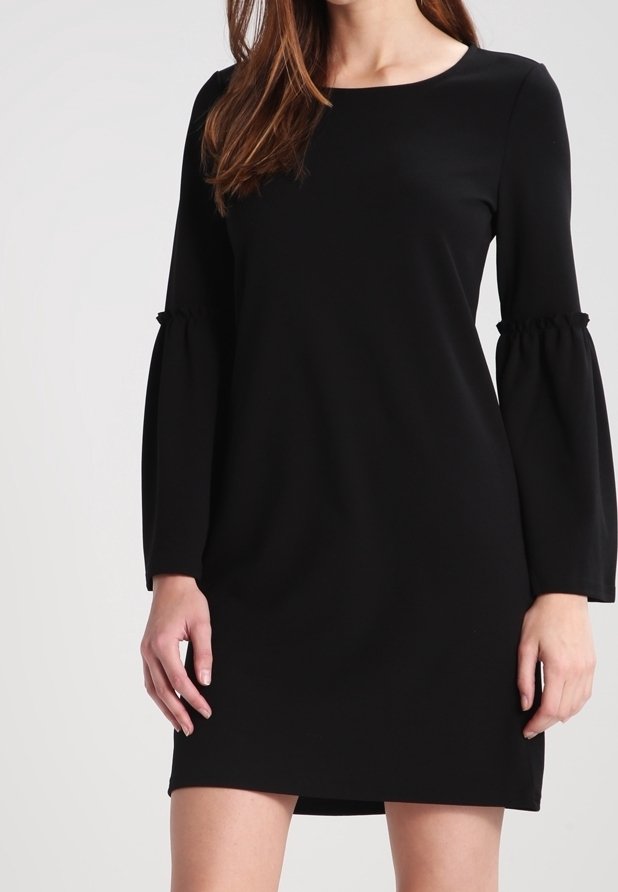 Black dress with long bell sleeves, round neckline, and a fitted silhouette. Made from smooth fabric for a minimalist look.