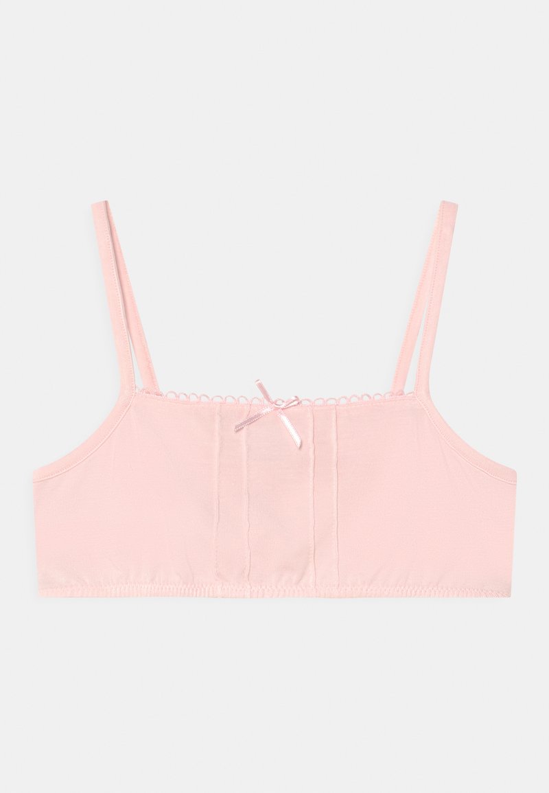 Bralette de algodão rosa com alças ajustáveis, uma textura suave e um laço decorativo ao centro. Apresenta um design simples.
