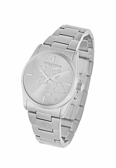 Srebrny zegarek z tarczą ozdobioną sercami i metalową bransoletą, z widoczną nazwą marki Zadig & Voltaire.