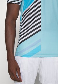 adidas Performance HEAT.RDY FREELIFT - T-shirt print - light aqua