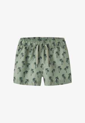 Short de bain vert à cordon de serrage avec imprimé de palmiers noirs et taille élastique.