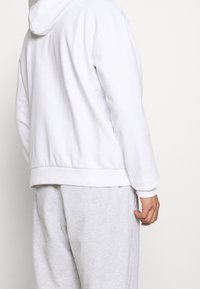 Karl Kani Mikina s kapucí - white