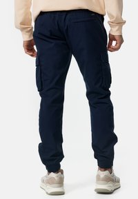 INDICODE JEANS Reisitaskuhousut - navy
