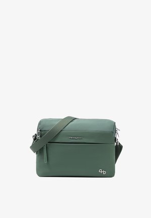 Sac bandoulière rectangulaire vert avec poche avant zippée, sangle réglable et logo de la marque Hedgren au centre avant et dans le coin inférieur droit.