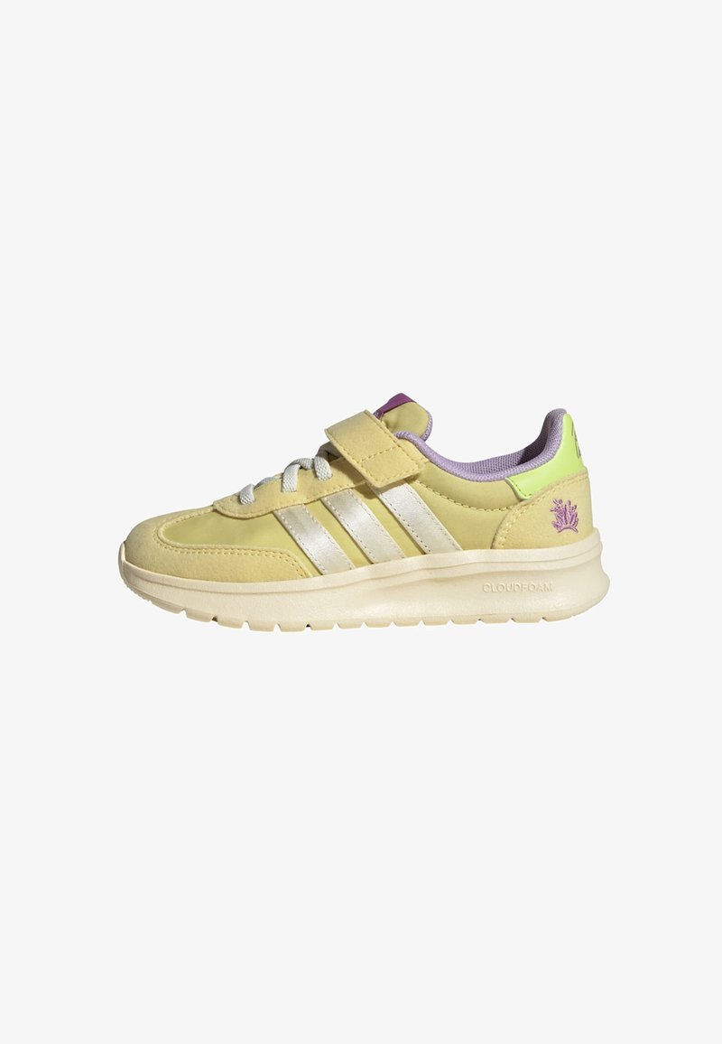 Yellow sneaker with silver stripes, Velcro strap, cushioned sole, purple and green accents, and textured fabric. Features "CLOUDfoam" branding.