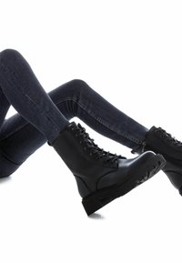 XTI Stivaletti con plateau - black