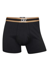 Sorte bokser-shorts lavet af blødt materiale. Har en guld- og sort elastisk talje med "CR7" logo. Sømløs konstruktion og tætsiddende design.
