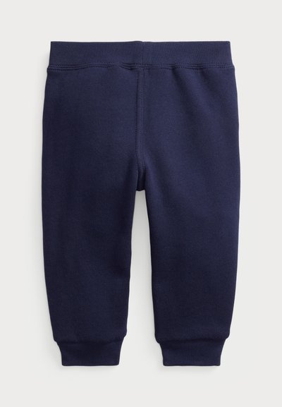 Las leggins de algodón azul marino cuentan con una cinturilla elástica, piernas ajustadas y puños acanalados, diseñadas para brindar comodidad y facilidad al usarlas.