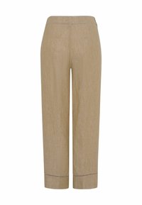 Beige linnebyxor med rak passform, med ett midjeband och kontrasterande sömmar i kanten. Lätt och synlig textur.