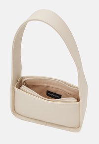 Sac à épaule en cuir beige avec une large bandoulière, forme rectangulaire, et compartiment intérieur zippé visible étiqueté "even&odd".